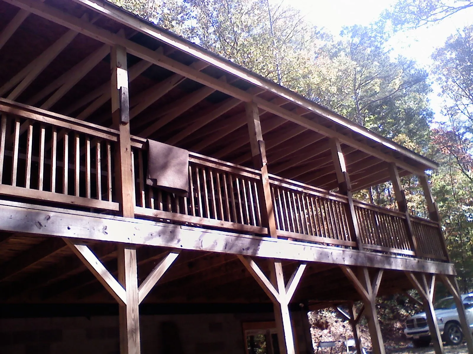 Timber framing under a new elevated porch and deck — Roof Leak Repair in Keuka Park by Roofing Brothers